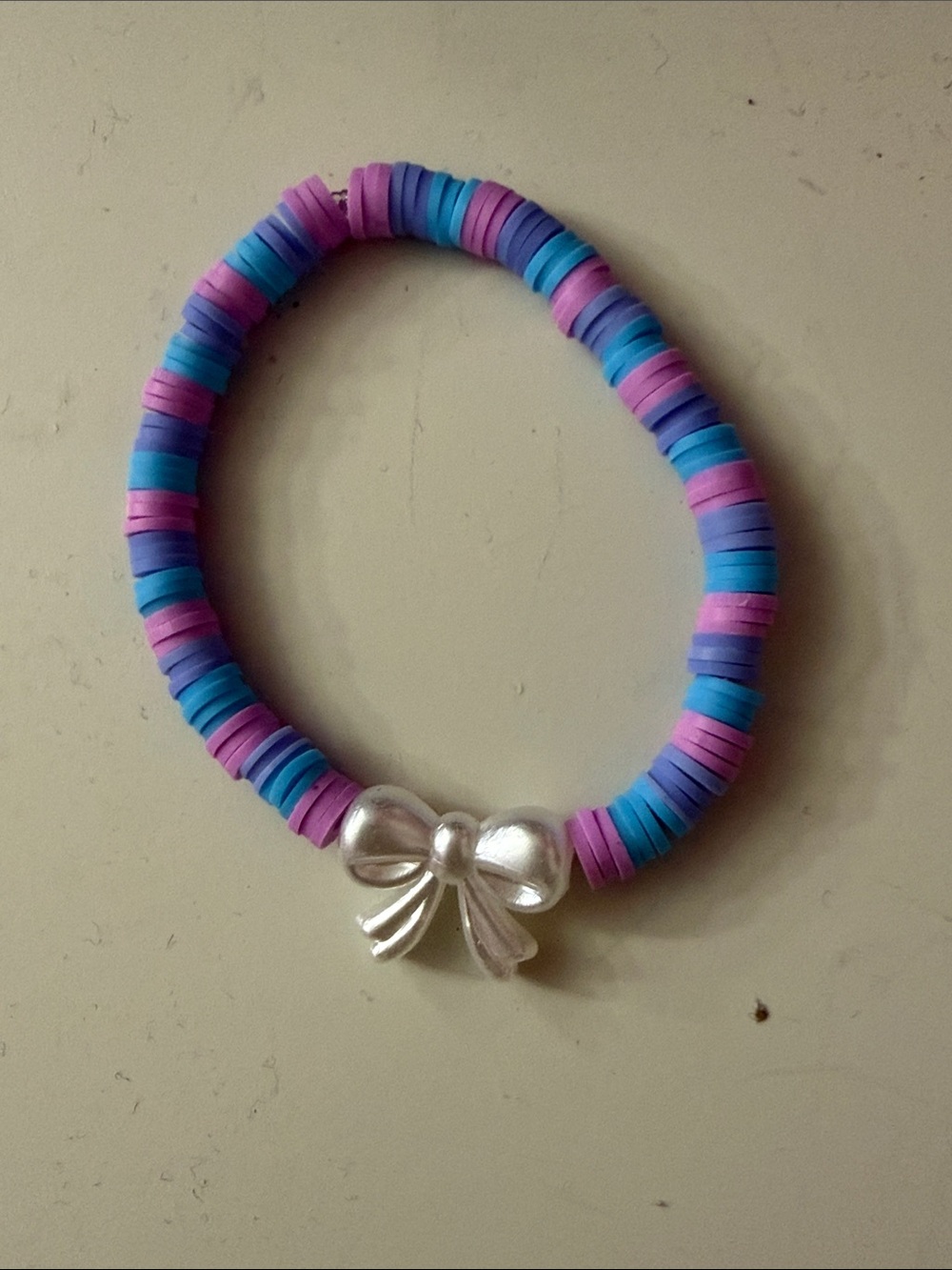 Kids Stretch Bracelet with Purple, Pink & Blue Beads and Silver Bow Charm